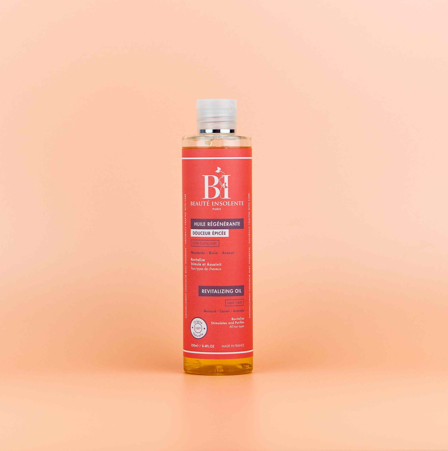 Huile régénérante pour cheveux texturés Beauté Insolente A01, formulée pour restaurer la vitalité des cheveux et prévenir la casse tout en apportant brillance et douceur