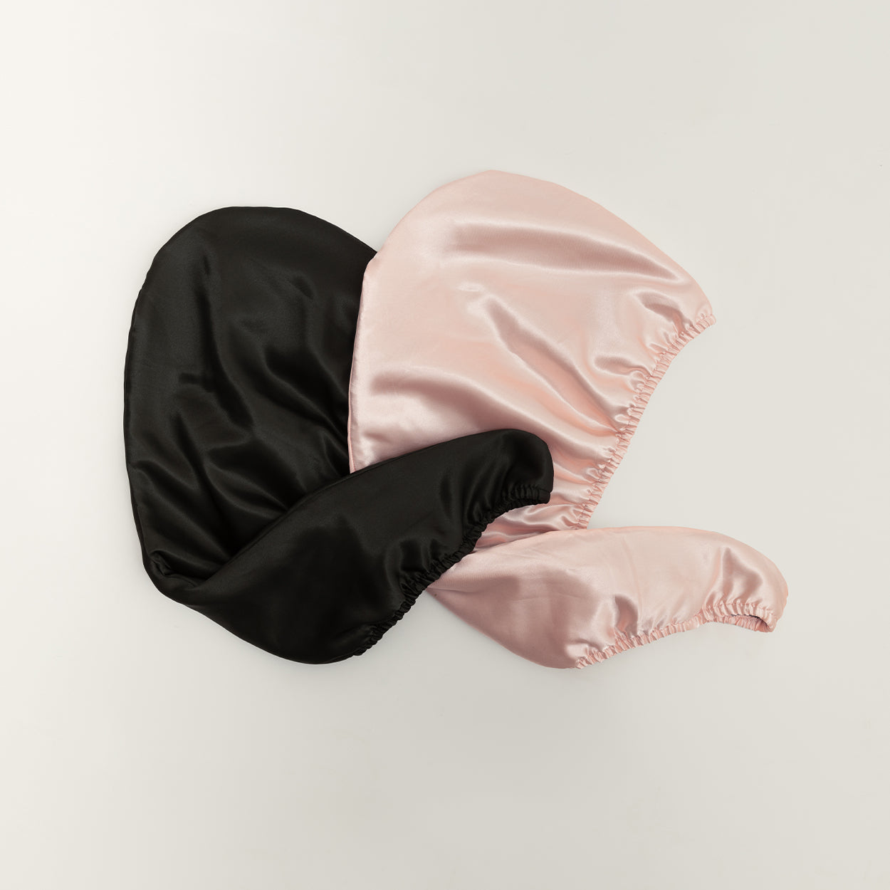 Serviette à cheveux à séchage rapide et réversible, idéale pour absorber l'humidité sans abîmer les cheveux, offrant douceur et confort tout en étant pratique à utiliser