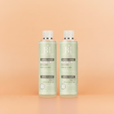 Photo publicitaire qualité studio, un lot de 2  flacons de shampooing purifiant beauté insolente  debout sur un fond neutre.